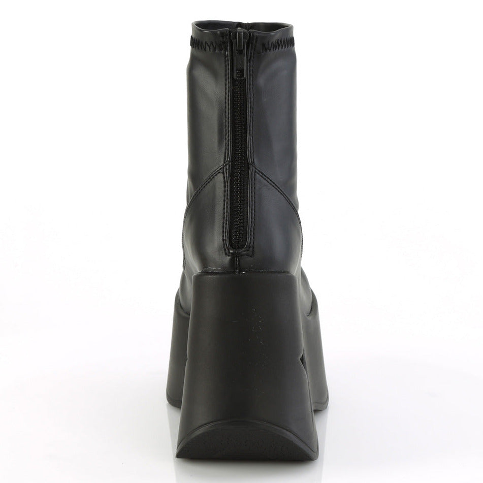Black stretch faux leather platform wedge ankle boots for festivals with 5-inch star cutout heel and back metal zipper.