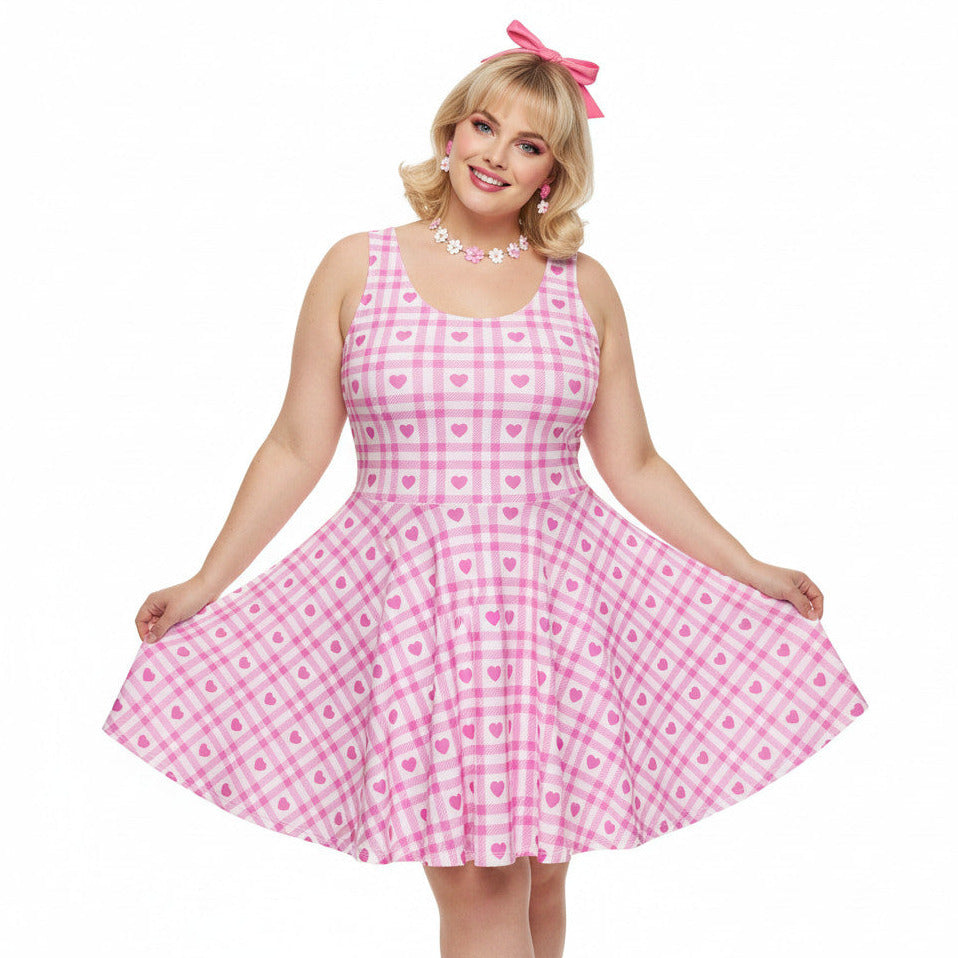 Plus size woman wearing a pink and white gingham 1950s vintage style fit and flare swing dress.