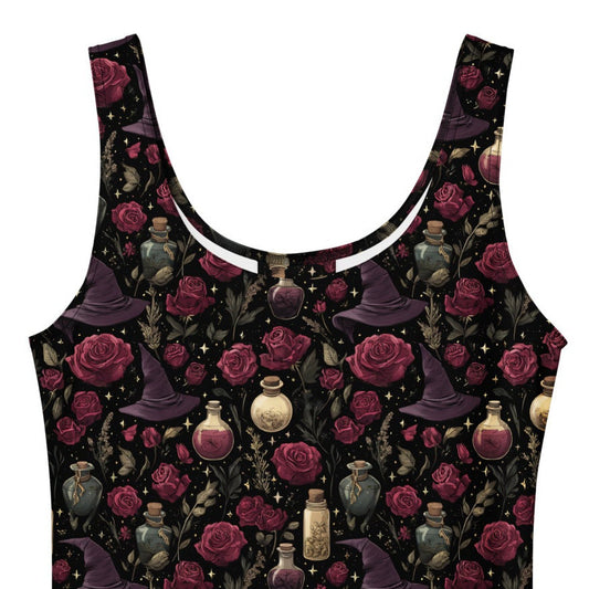 Black sleeveless dress with floral and witch hat pattern on a white background