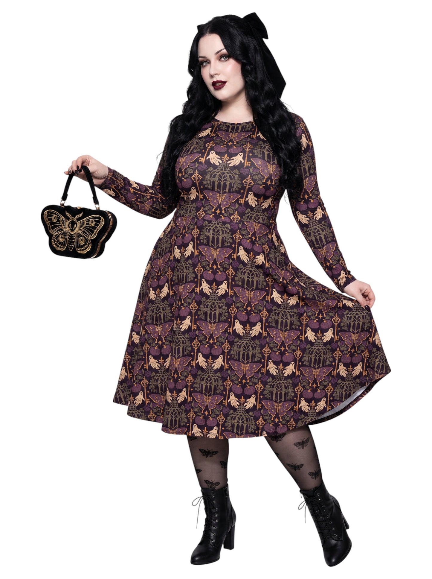 Plus size woman wearing a purple Whimsigoth gothic moth pattern long sleeve dress with pockets