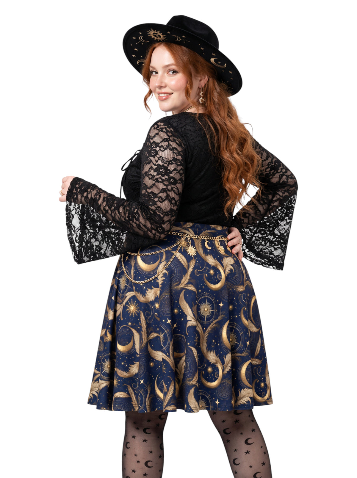 Plus size woman wearing a high-waisted whimsigoth celestial skater skirt featuring large gold crescent moons and starbursts.