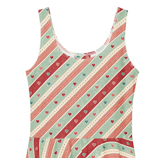 Sleeveless dress with red and green pattern on a white background