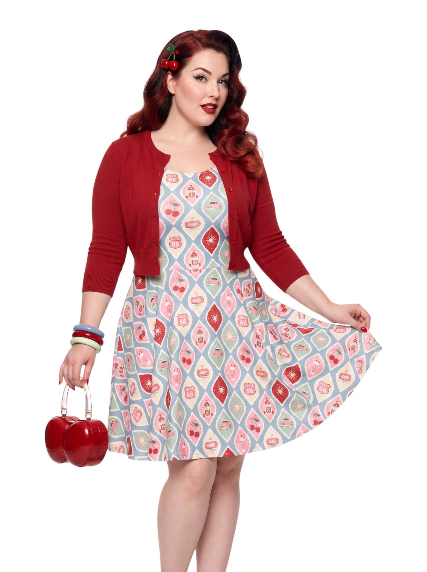 Plus size pinup woman wearing a 1950s style cherry diner milkshake pattern swing dress made of high stretch fabric