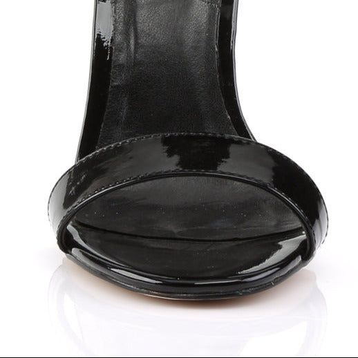 Black Patent Ankle Strap Heels on a white background