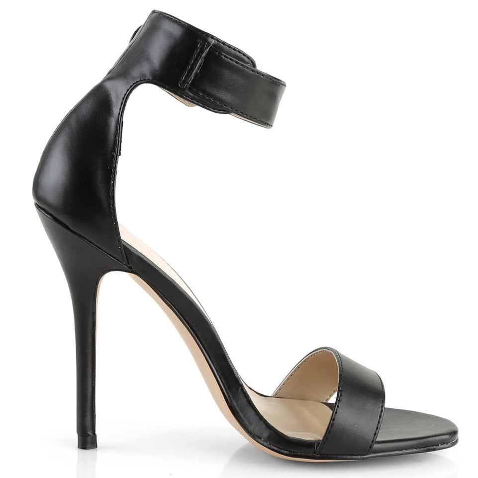 Black ankle strap stiletto heel on white background