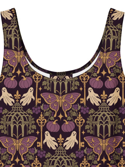 A whimsigoth dark purple dress featuring an intricate goth moth pattern and ornate keys.