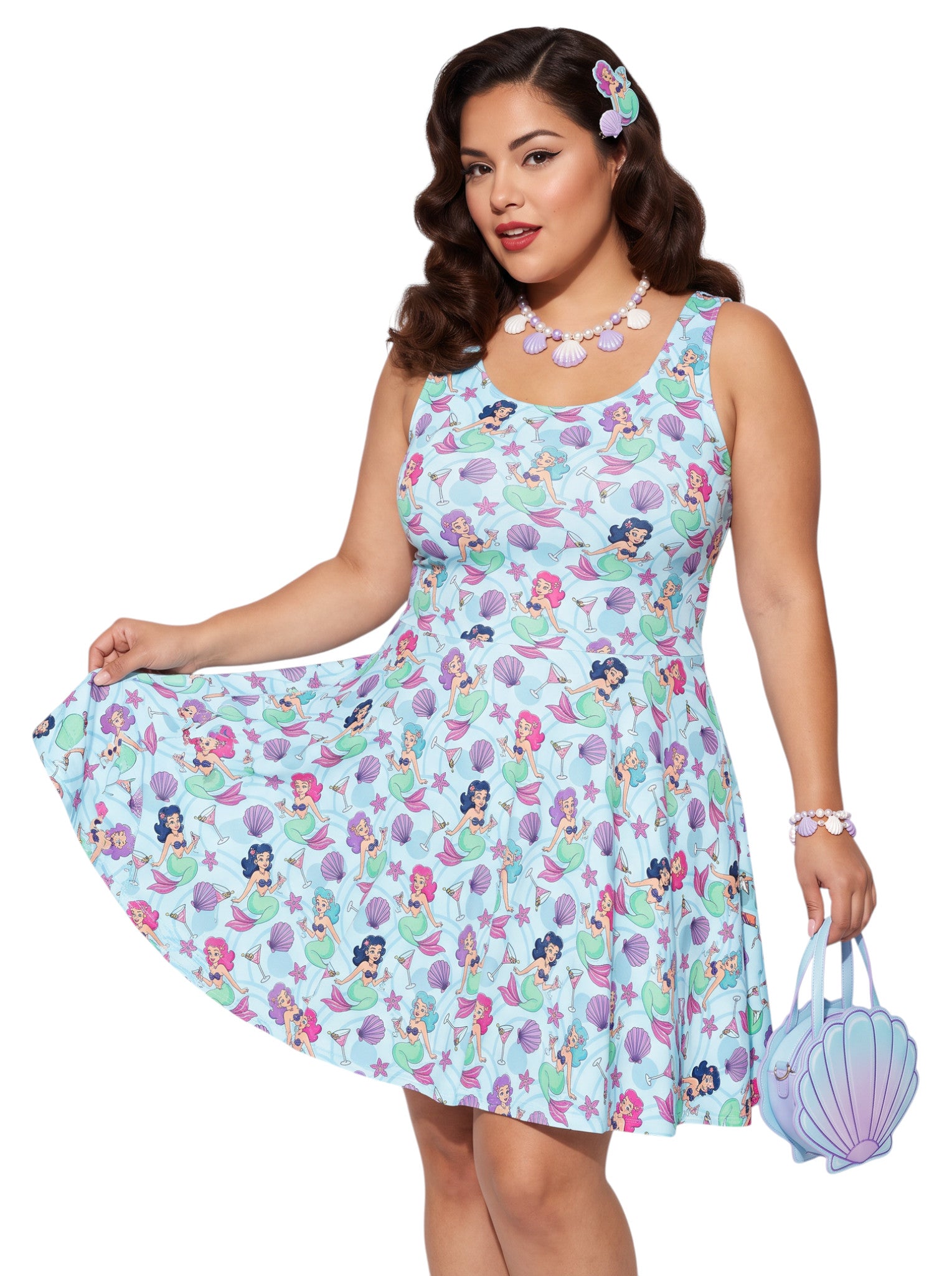 Curvy woman wearing a blue Mermaid and Martinis swing dress with a fit and flare silhouette.