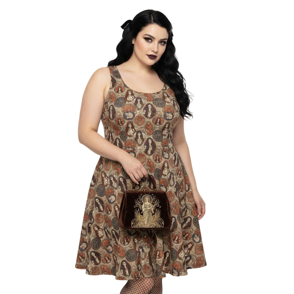 Woman wearing a cream and brown Whimsigoth skater dress with a vintage tarot card goddess medallion print.