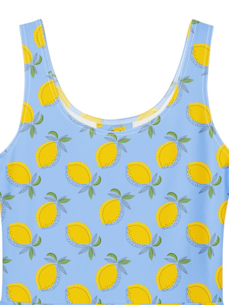 Blue dress with yellow lemon pattern on a white background