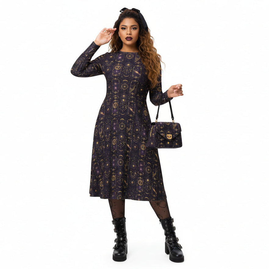 Woman wearing a patterned dress and holding a matching handbag on a white background