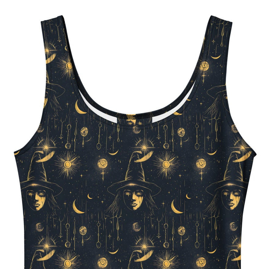 Black dress with gold celestial pattern on a white background