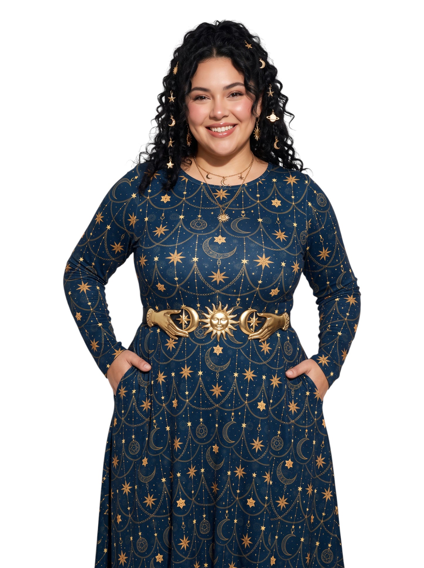 A woman modeling a long-sleeve navy blue dress with a gold celestial pattern of stars, moons, and suns, accessorized with a wide gold belt, against a plain white background.