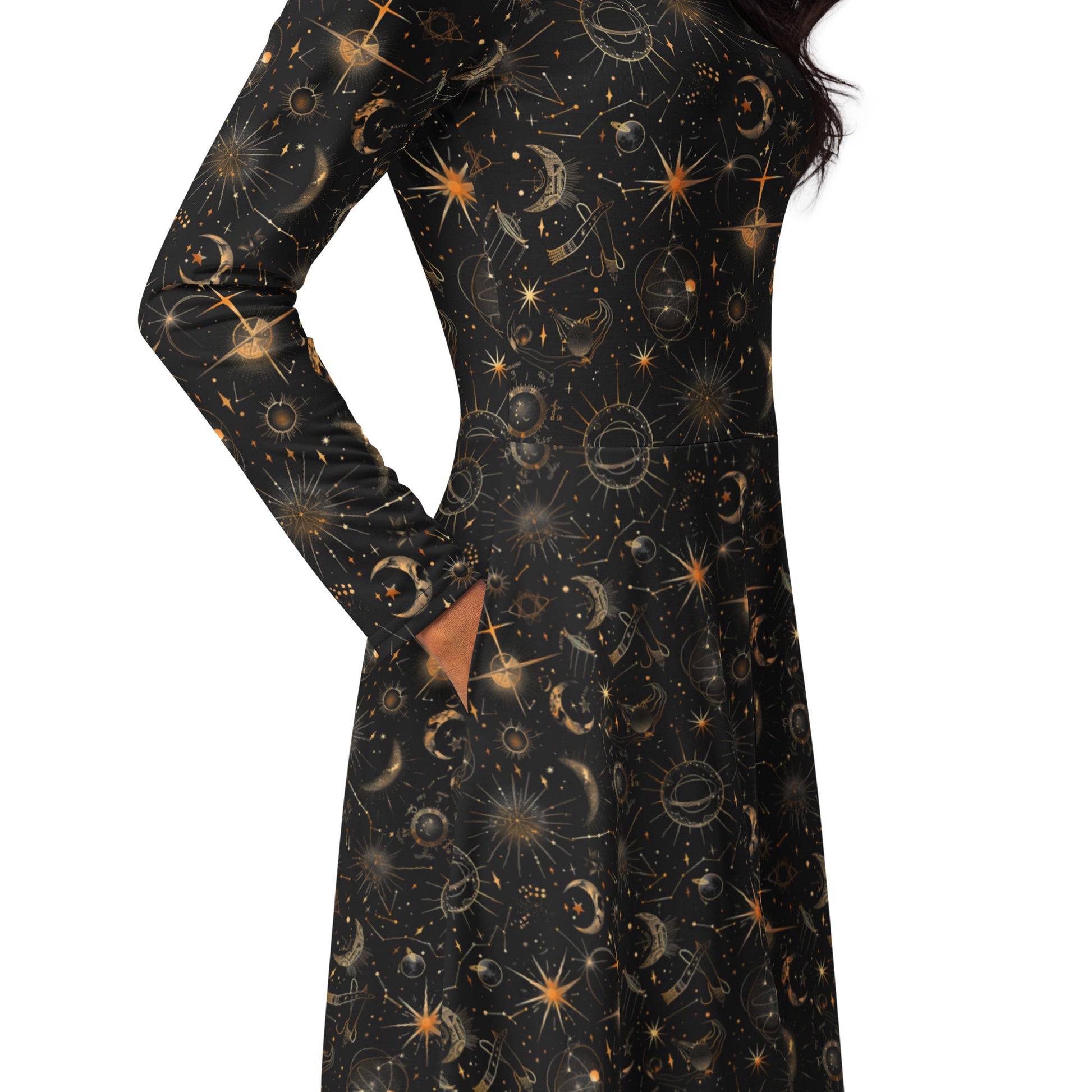 Long-sleeve dress with celestial sun moon and stars print on a white background