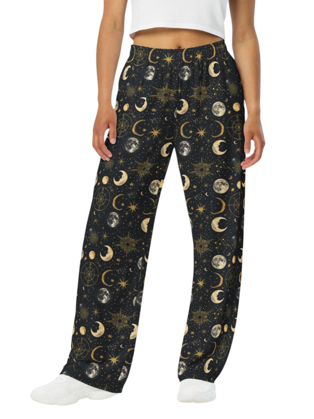 Woman wearing Whimsigoth celestial wide leg lounge pants with sun, moon, and star print.