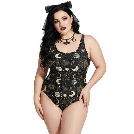 Plus size woman wearing a black celestial one piece swimsuit with gold sun, moon, and star patterns in a gothic style.