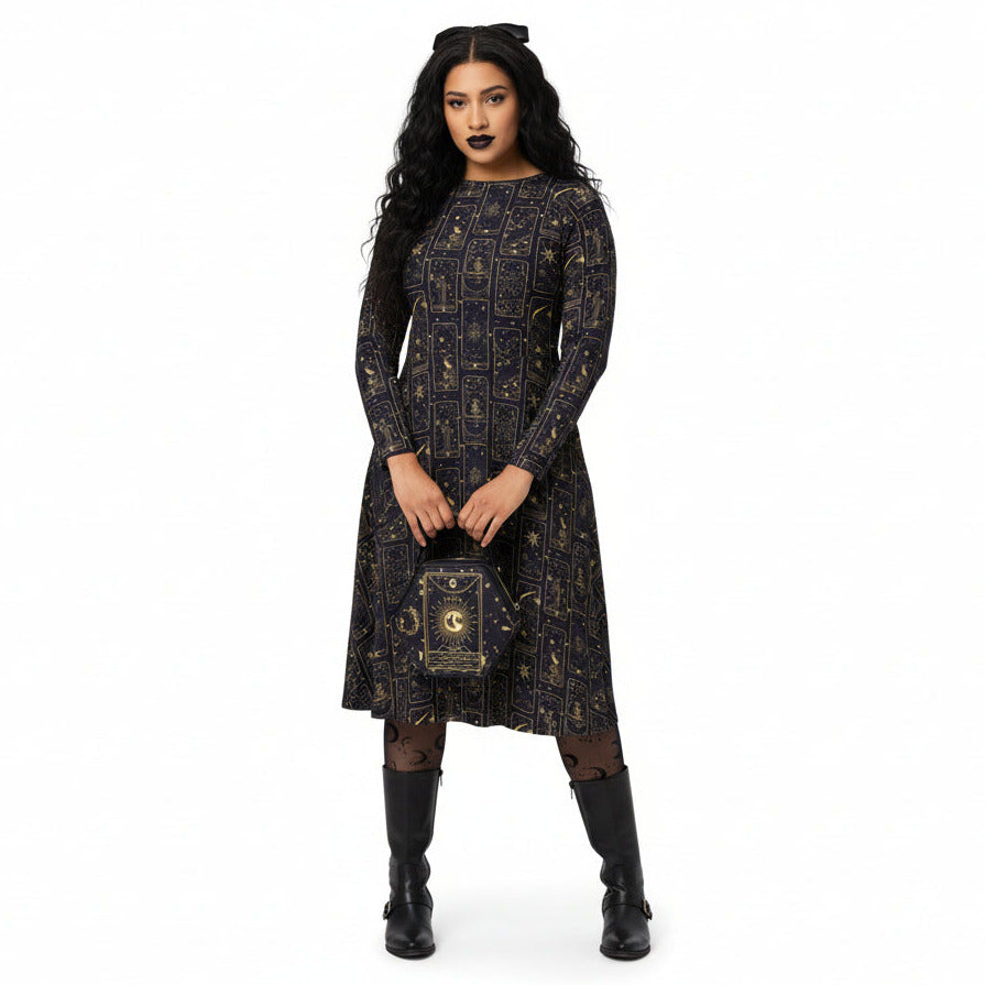 Woman wearing a long, celestial tarot card print dress on a white background