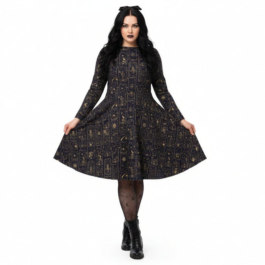 Woman wearing a celestial tarot card print dress on a white background