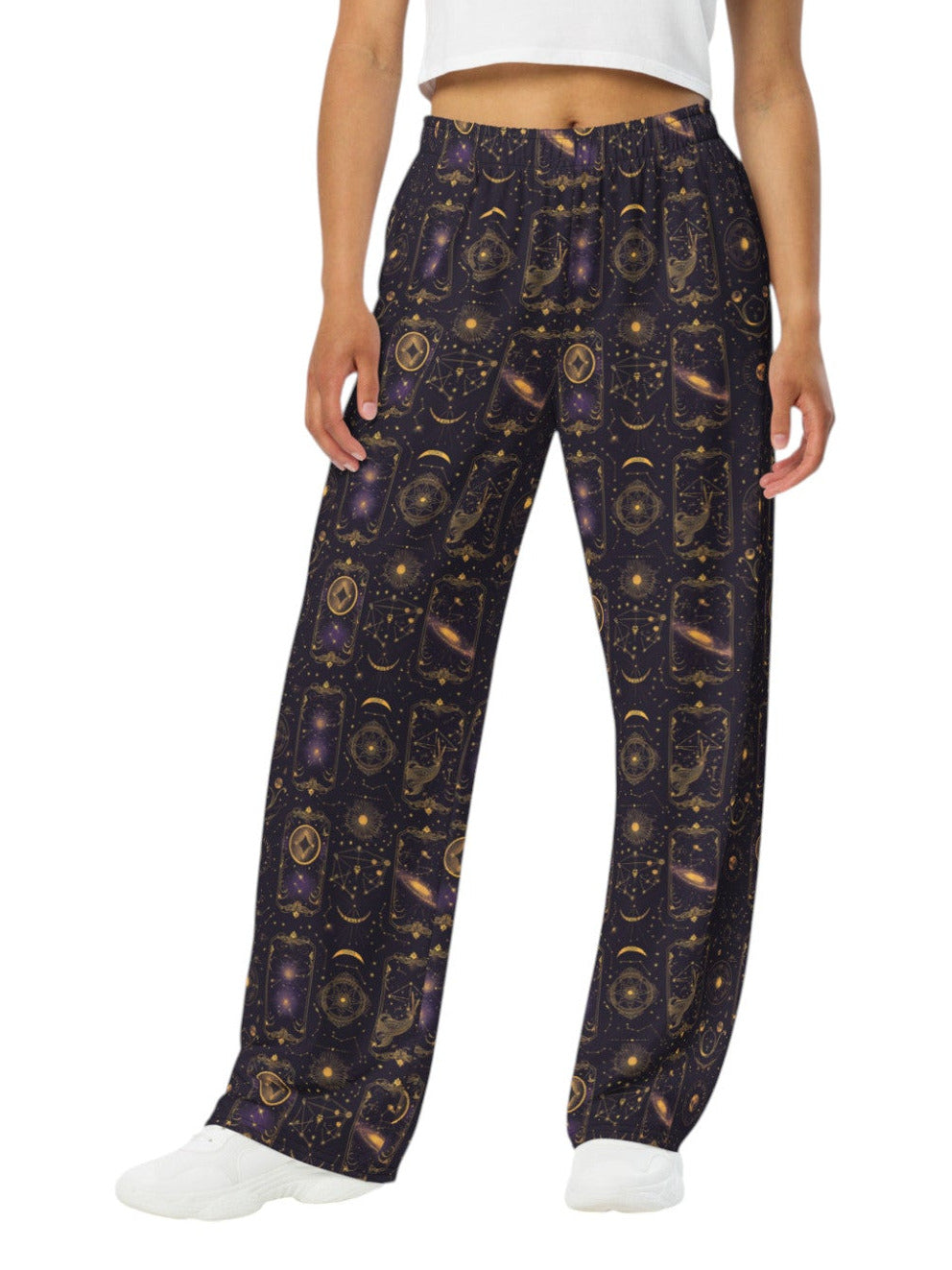 Woman wearing Whimsigoth Tarot Card Celestial wide leg lounge pants with sun moon stars pattern and side pockets.