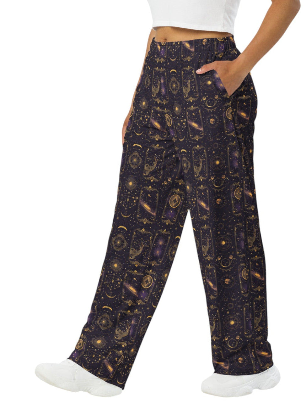 Woman wearing Whimsigoth Tarot Card Celestial wide leg lounge pants with sun moon stars pattern and side pockets.