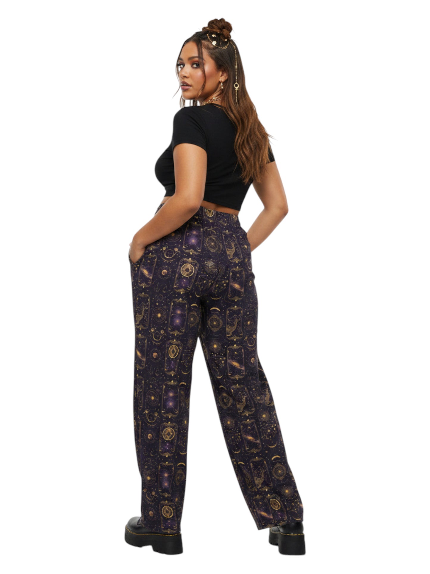 Plus-size model wearing Whimsigoth Tarot Card Celestial wide leg lounge pants with sun moon stars pattern and side pockets.