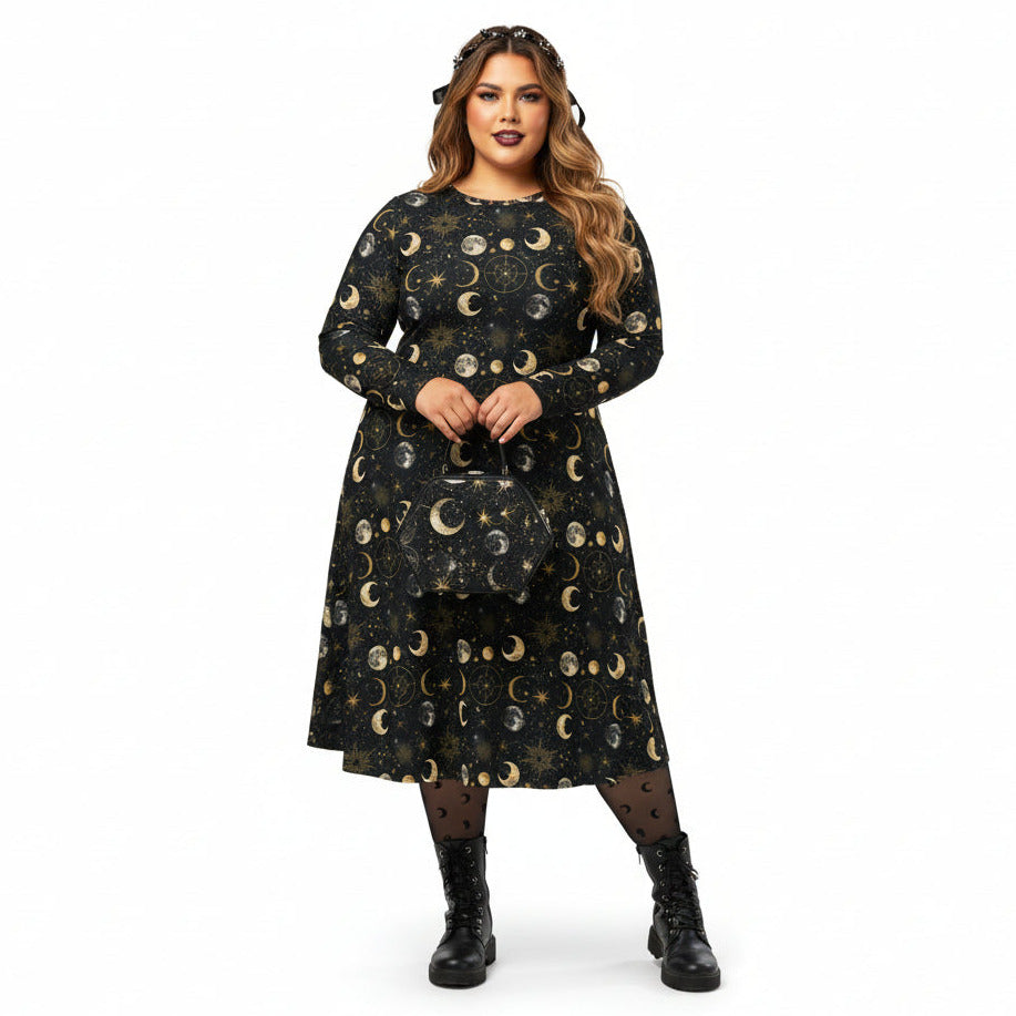 Woman wearing a black dress with gold moon phases on a white background