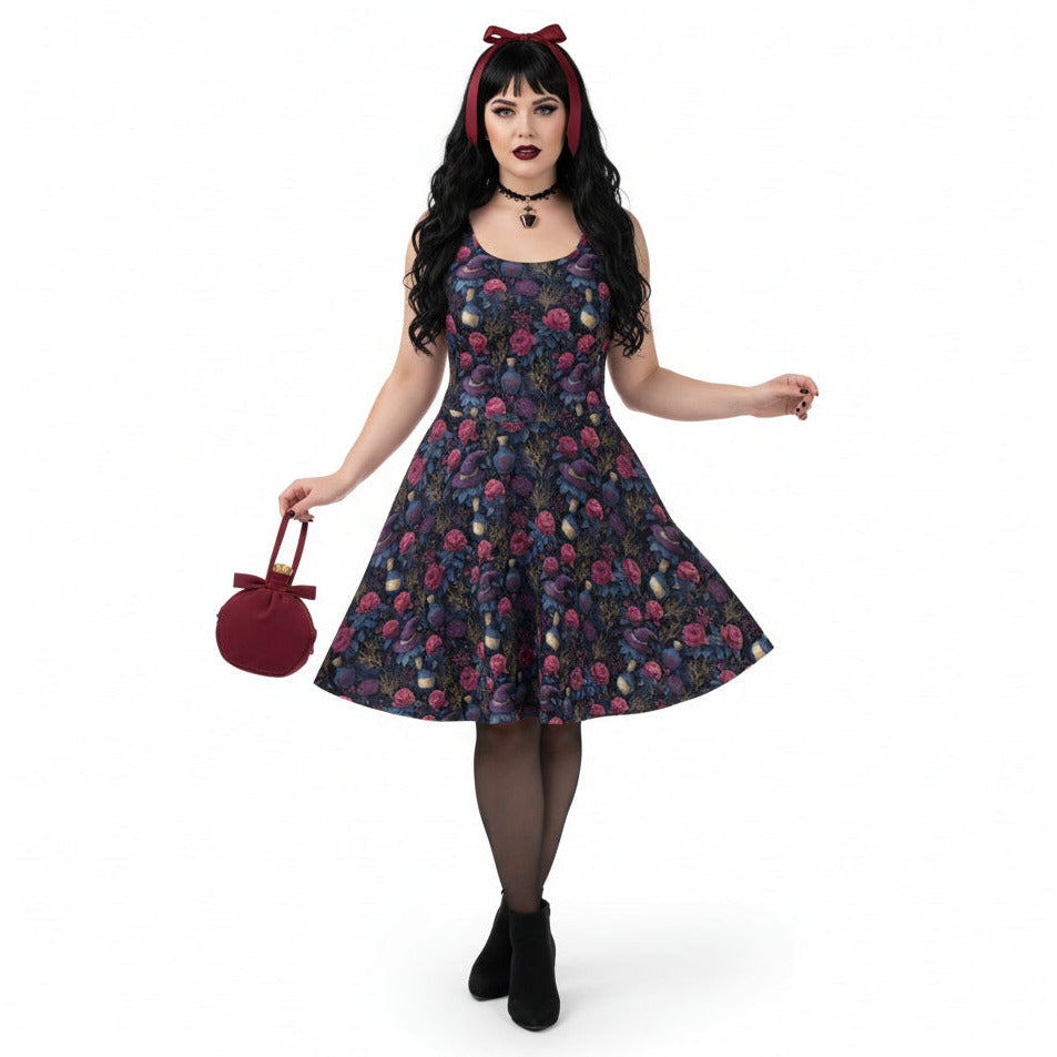 Woman wearing a floral dress holding a red bag on a white background