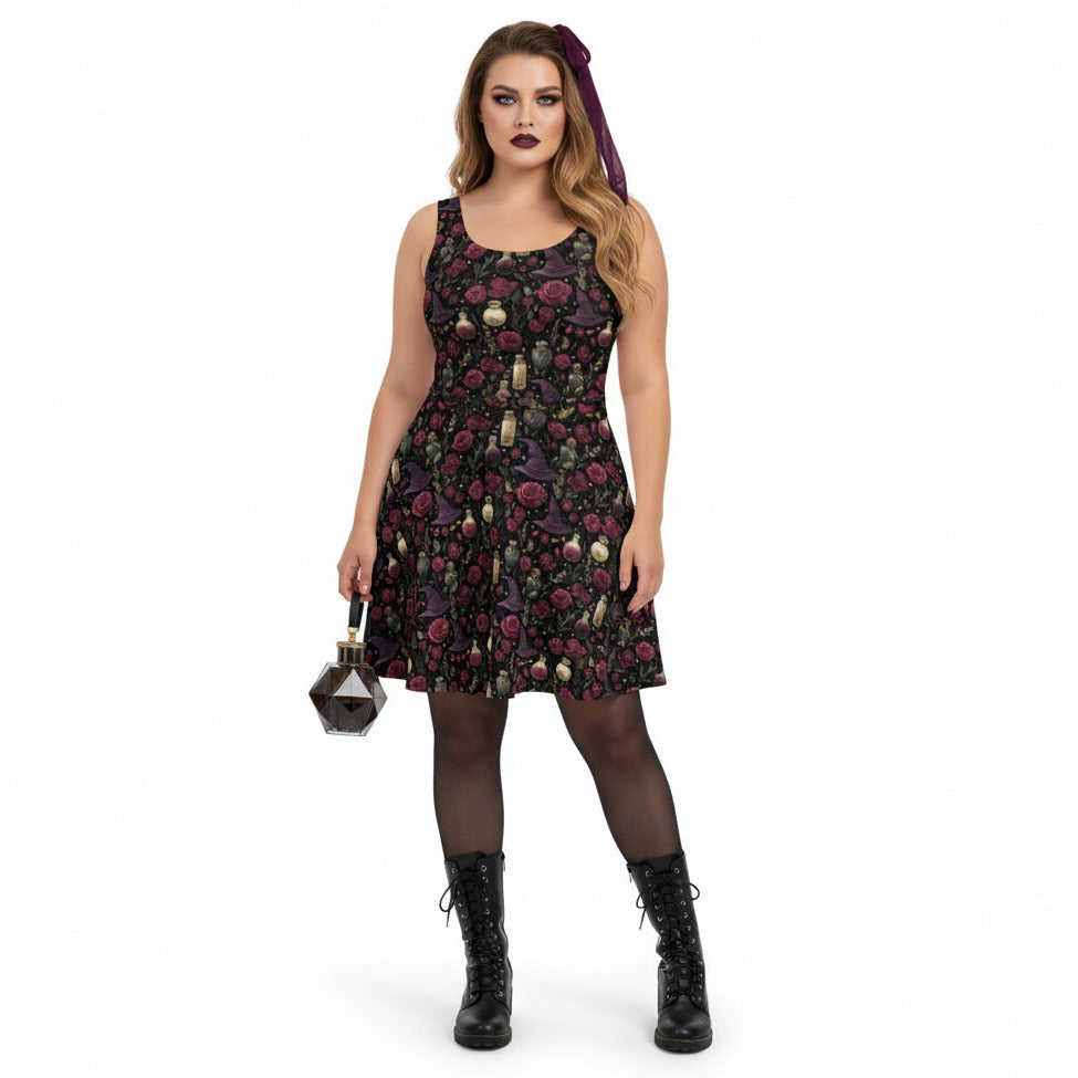 Woman wearing a black floral dress with black boots on a white background