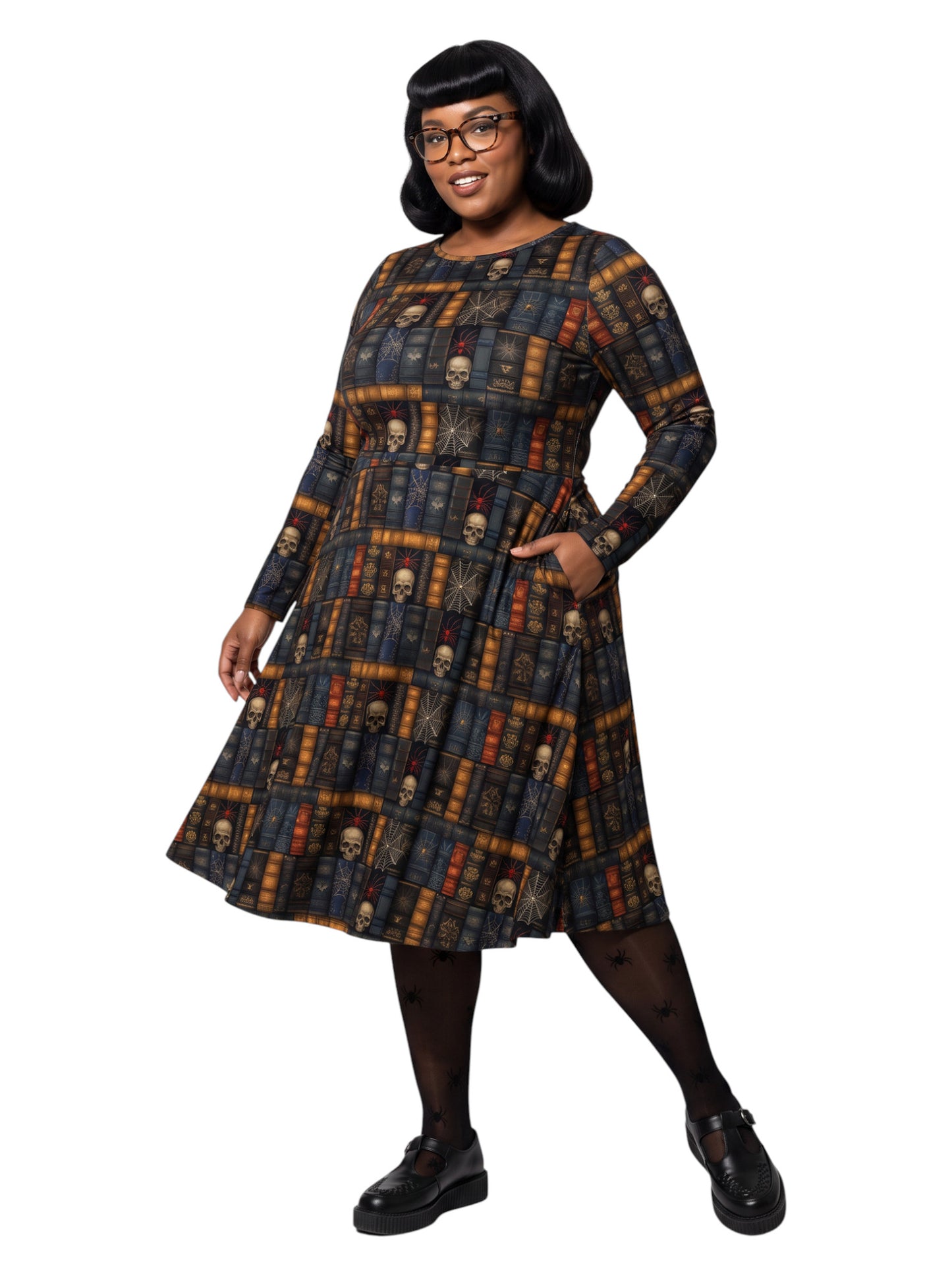 Plus-size model smiling in a Dark Academia midi dress featuring a bookshelf print with vintage books, skulls, and spiderwebs, designed with long sleeves and a fit-and-flare silhouette.
