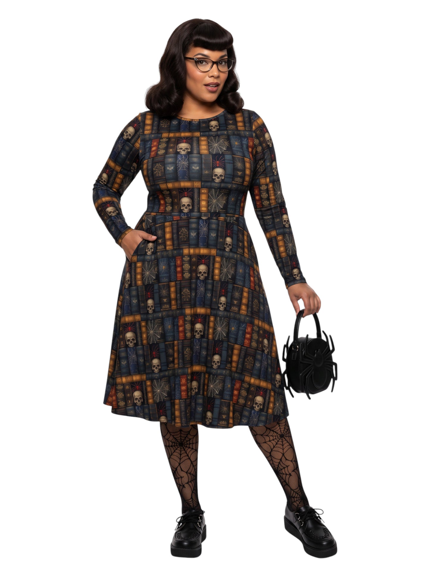 Plus-size model smiling in a Dark Academia midi dress featuring a bookshelf print with vintage books, skulls, and spiderwebs, designed with long sleeves and a fit-and-flare silhouette.