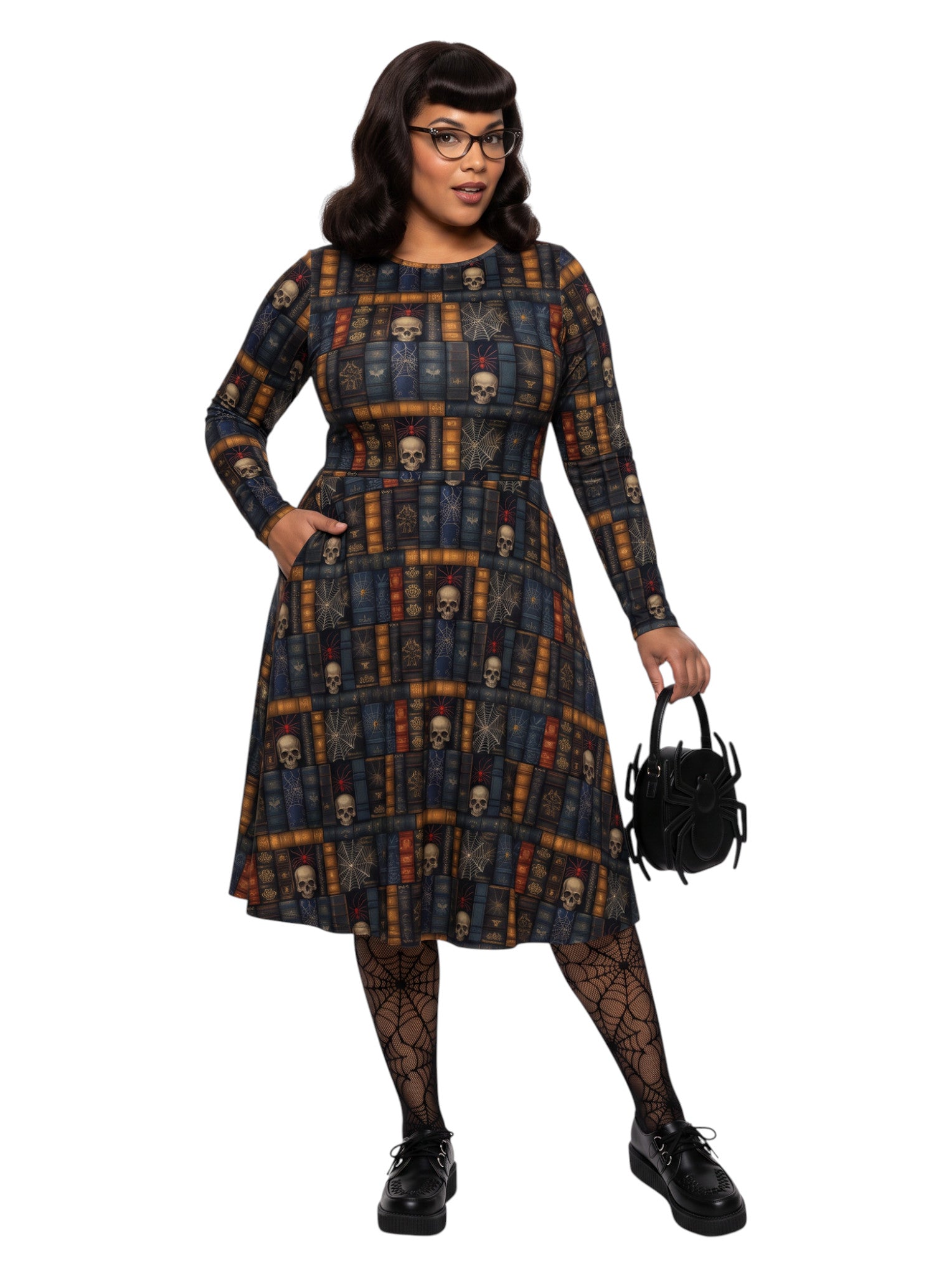 Plus-size model smiling in a Dark Academia midi dress featuring a bookshelf print with vintage books, skulls, and spiderwebs, designed with long sleeves and a fit-and-flare silhouette.