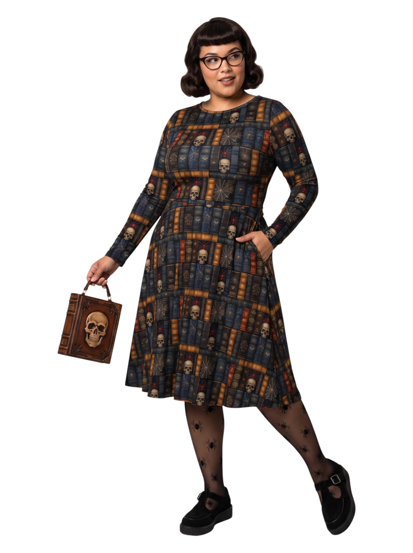 Plus-size model smiling in a Dark Academia midi dress featuring a bookshelf print with vintage books, skulls, and spiderwebs, designed with long sleeves and a fit-and-flare silhouette.