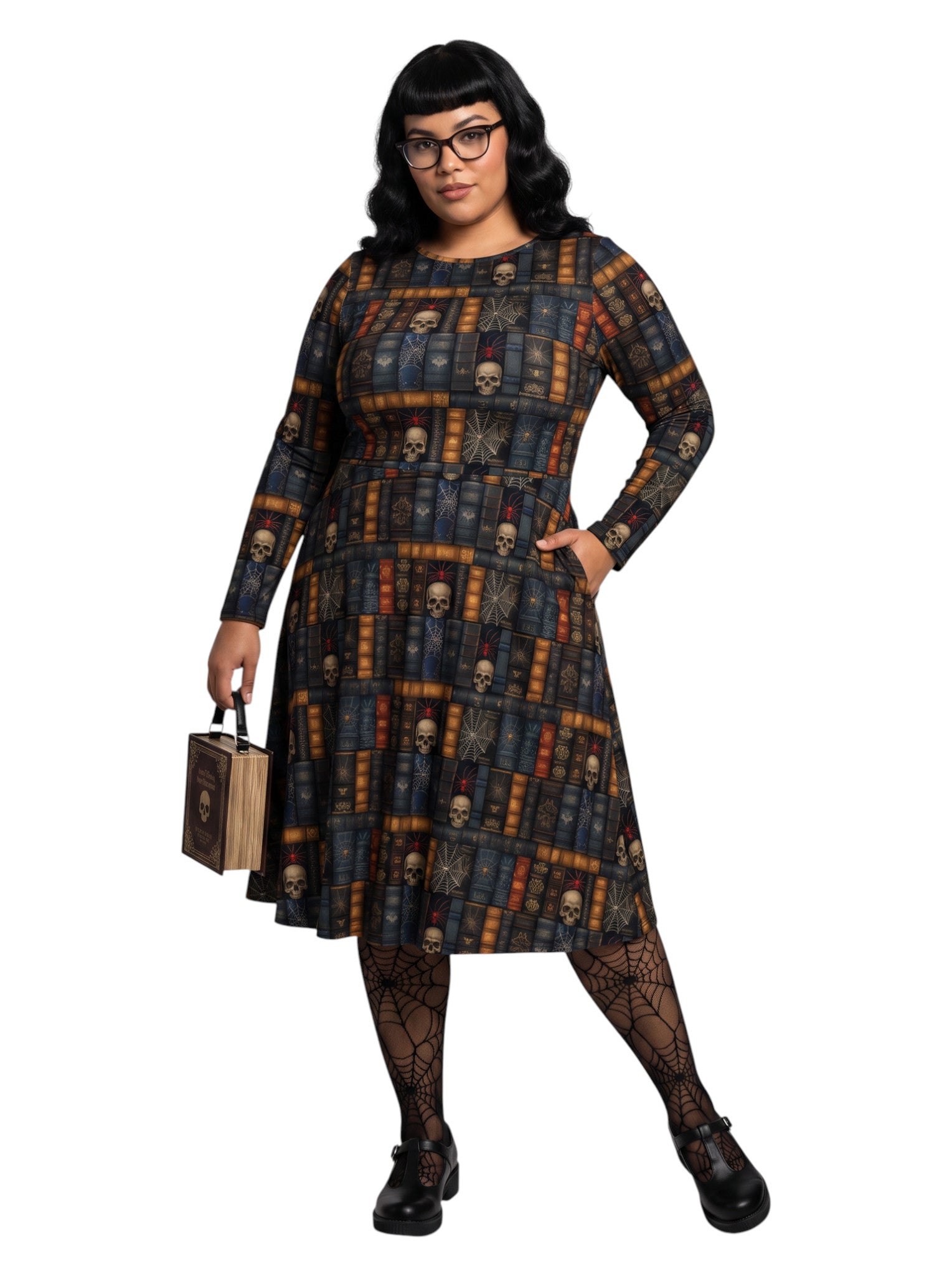 Plus-size model smiling in a Dark Academia midi dress featuring a bookshelf print with vintage books, skulls, and spiderwebs, designed with long sleeves and a fit-and-flare silhouette.