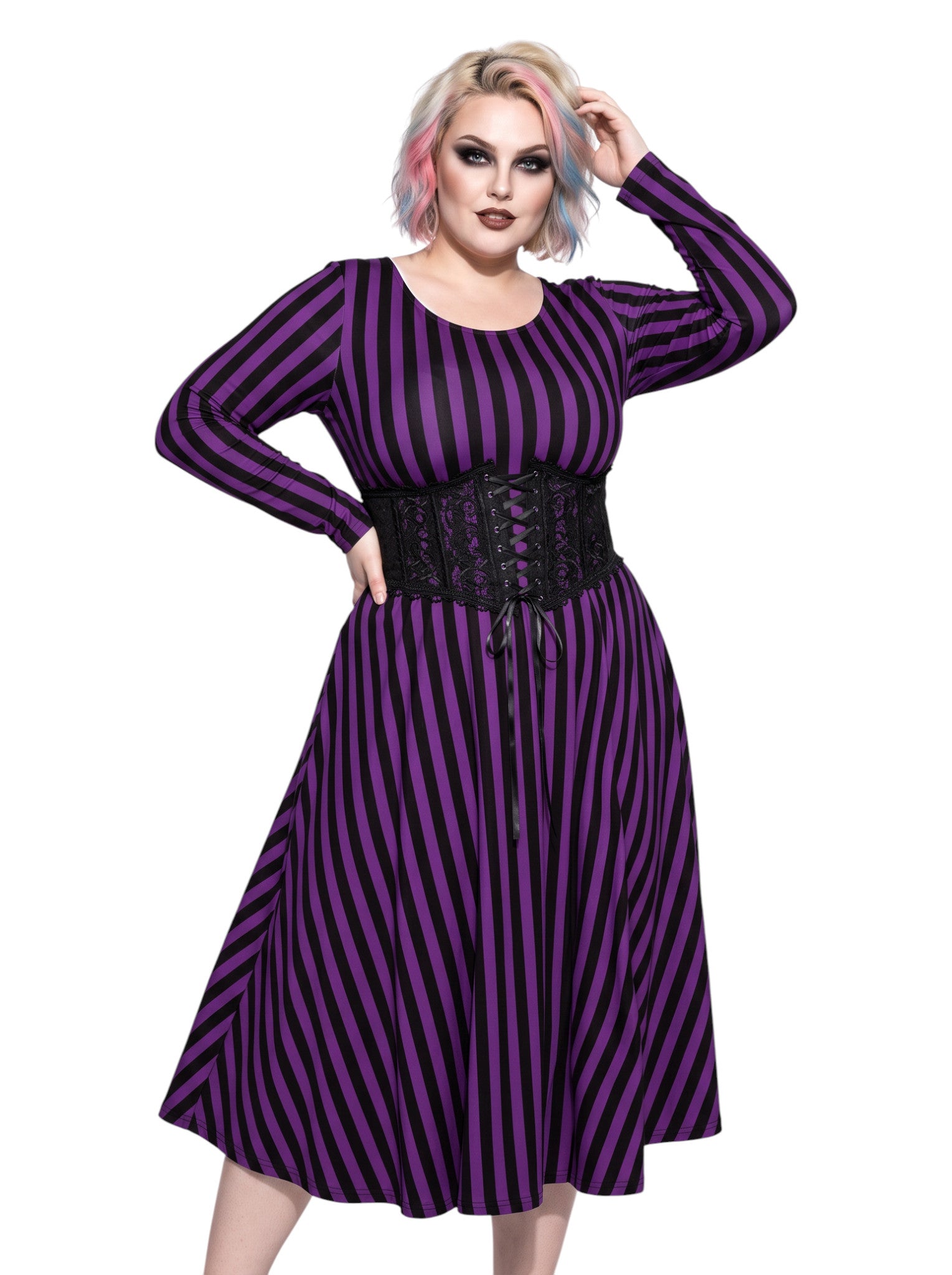 Plus size woman modeling gothic purple and black vertically striped long sleeve fit and flare midi dress with side pockets