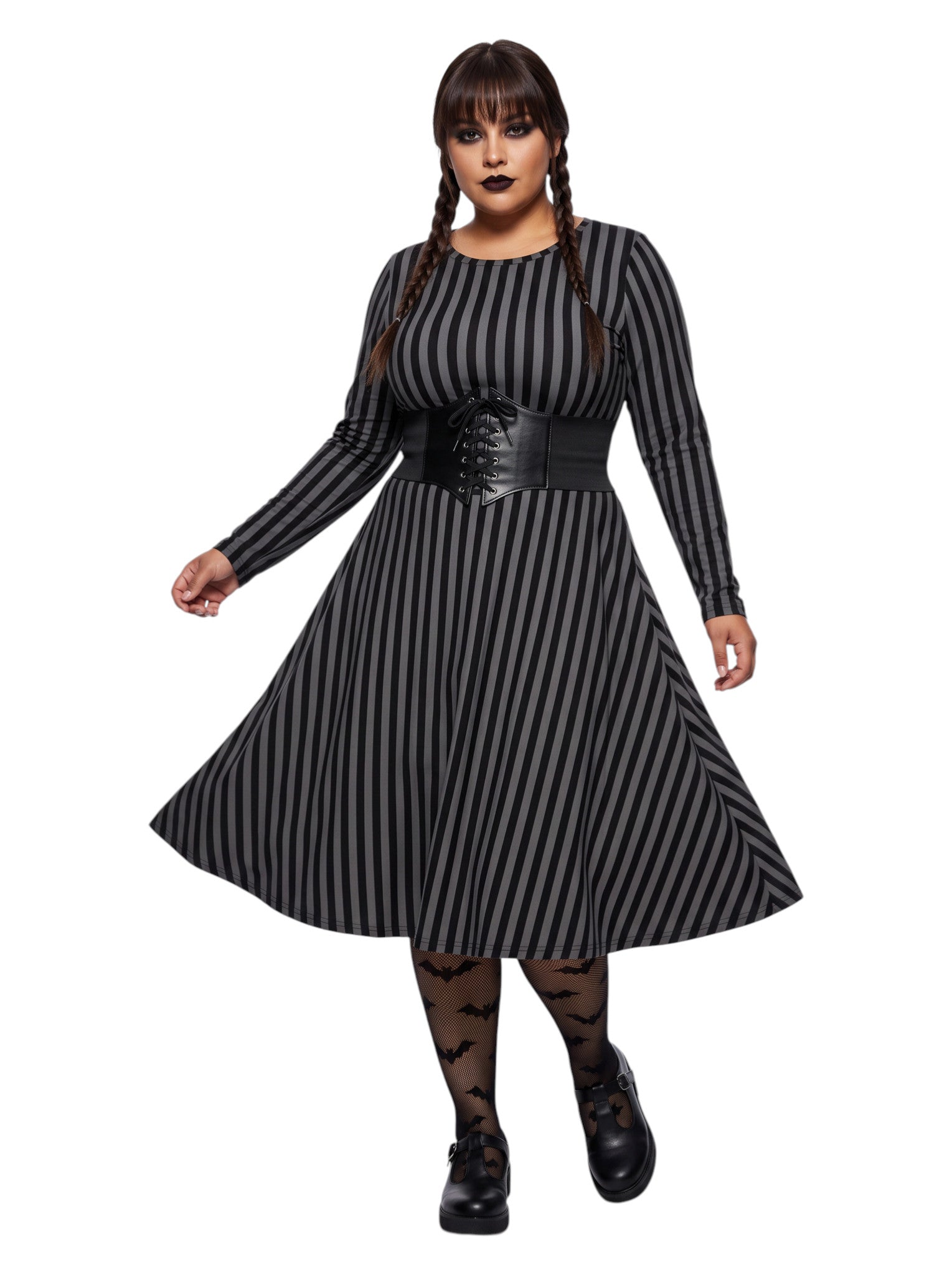 Plus size woman wearing a gothic grey and black vertically striped fit and flare midi dress with long sleeves, functional side pockets, and a scoop neckline.