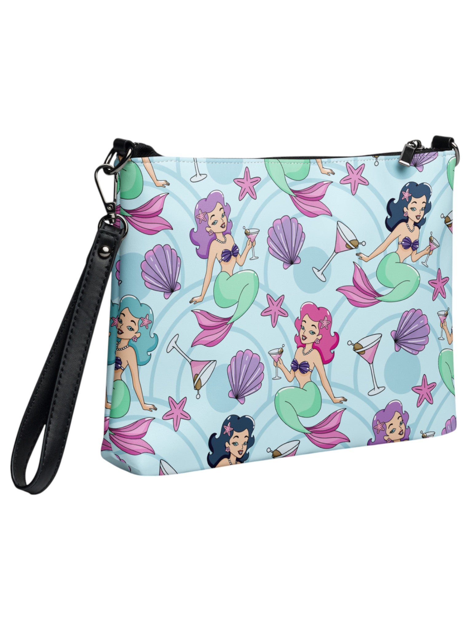 Mermaids, martinis and seashells convertible clutch and crossbody bag in faux leather with adjustable strap.