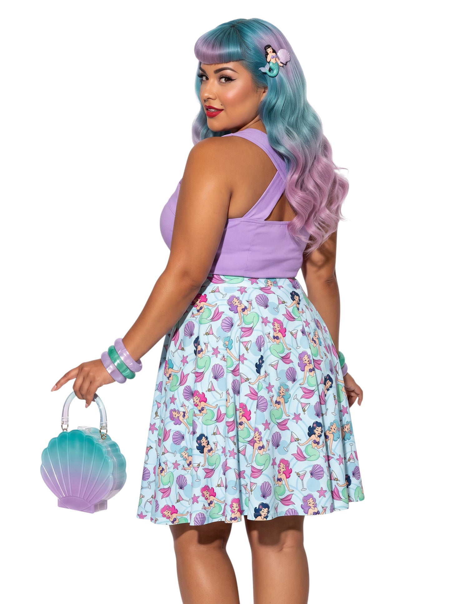 Plus-size woman wearing a Mermaids and Martinis flare swing skirt.