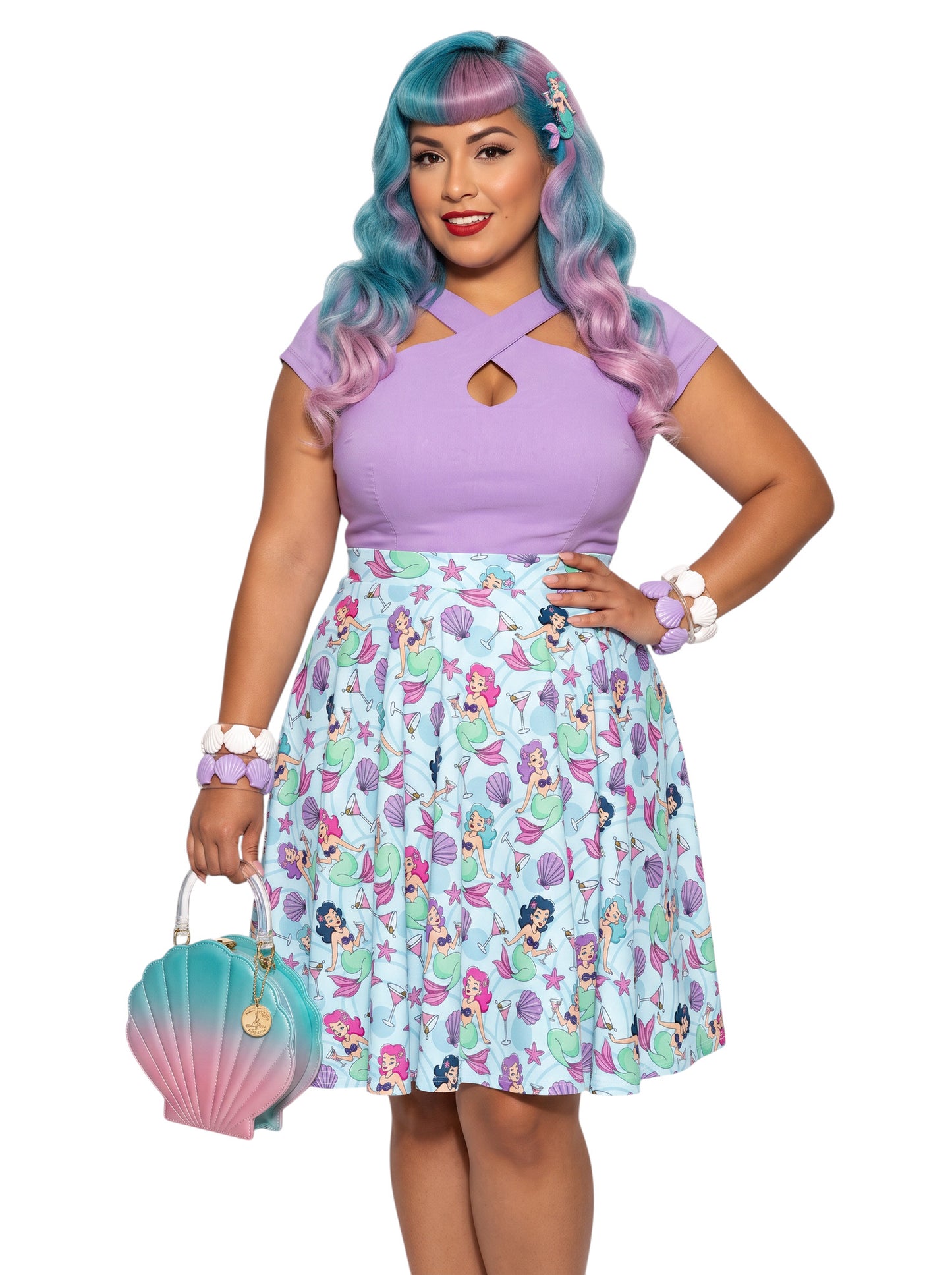 Plus-size woman wearing a Mermaids and Martinis flare swing skirt.