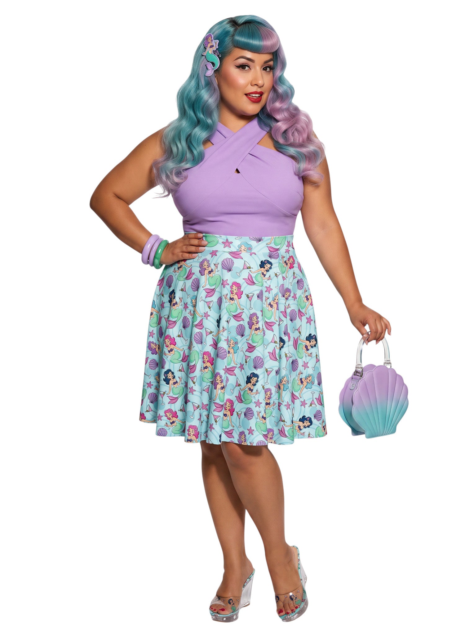 Plus-size woman wearing a Mermaids and Martinis flare swing skirt.