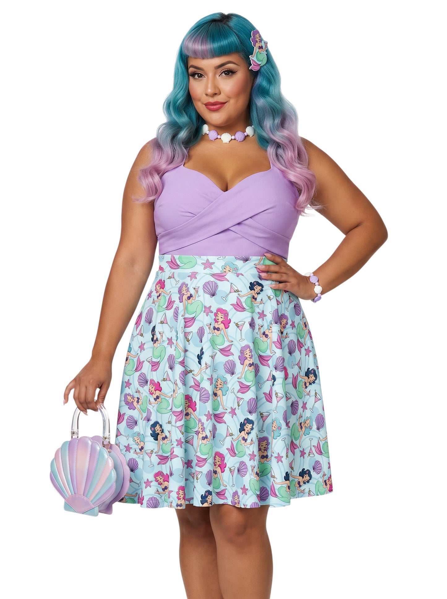 Plus-size woman wearing a Mermaids and Martinis flare swing skirt.