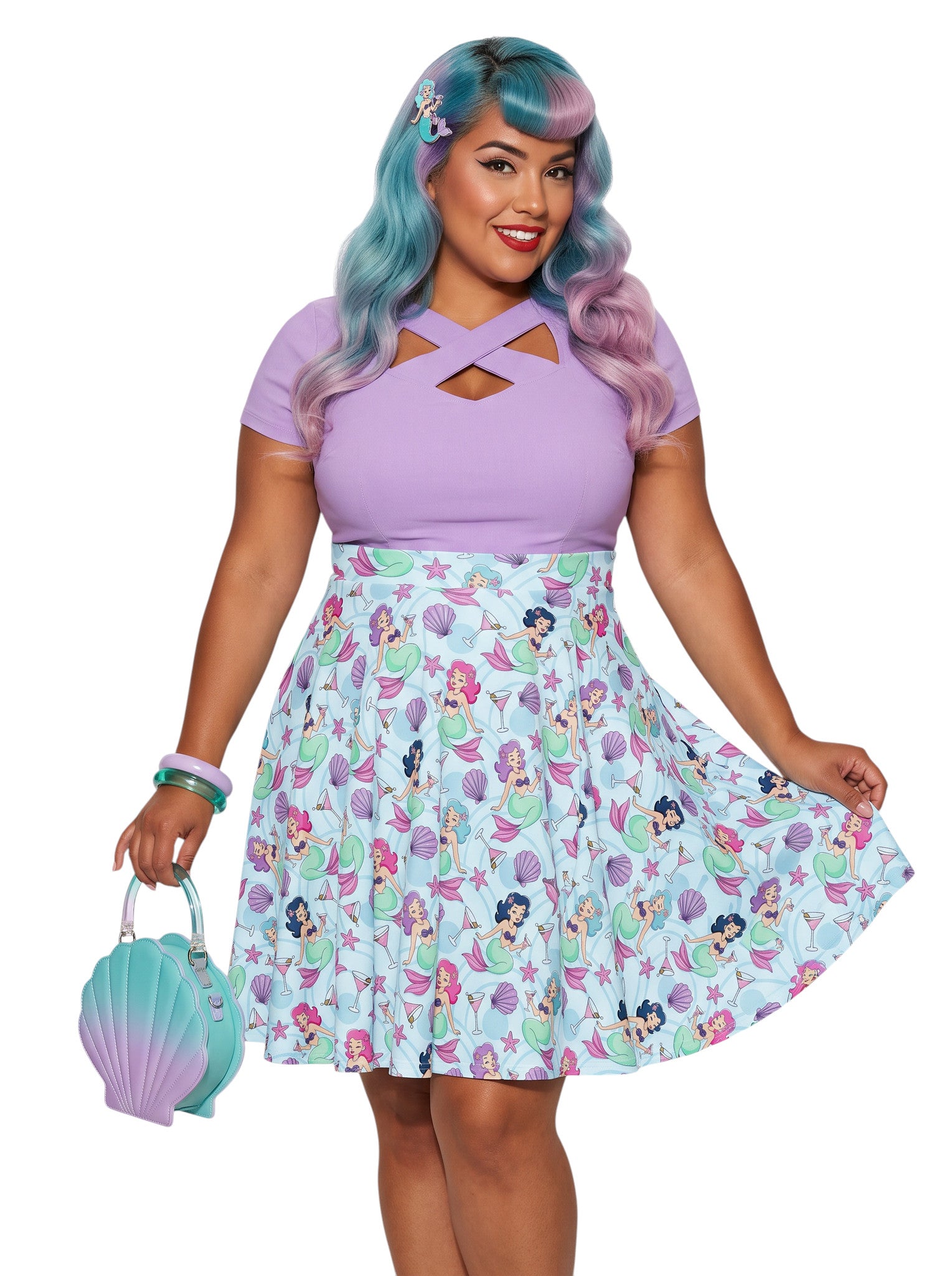 Plus-size woman wearing a Mermaids and Martinis flare swing skirt.