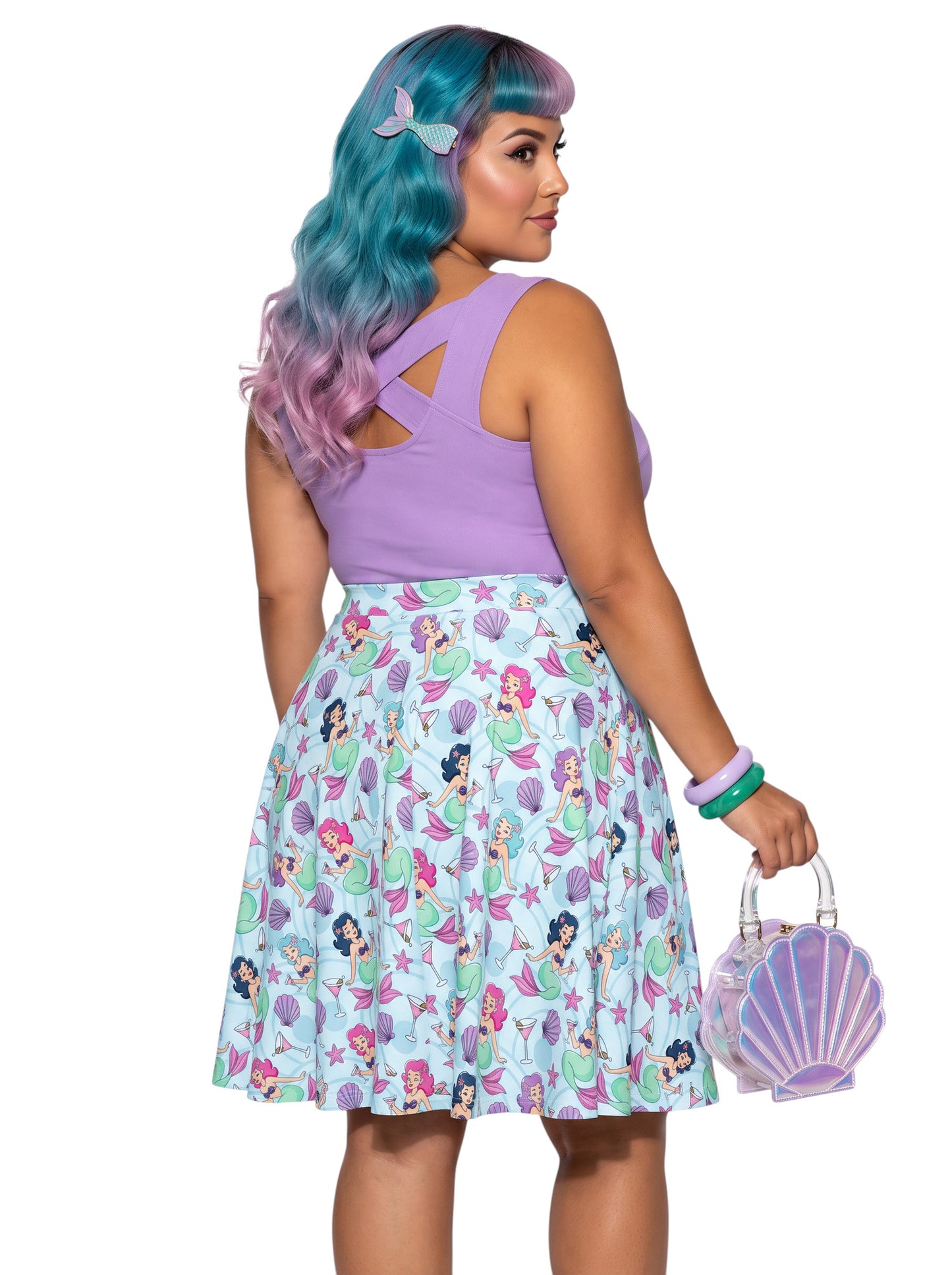 Plus-size woman wearing a Mermaids and Martinis flare swing skirt.