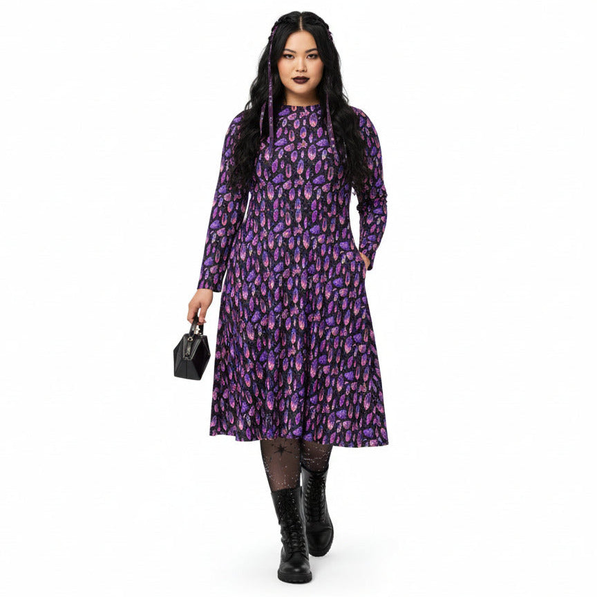 Woman wearing a purple floral dress on a white background