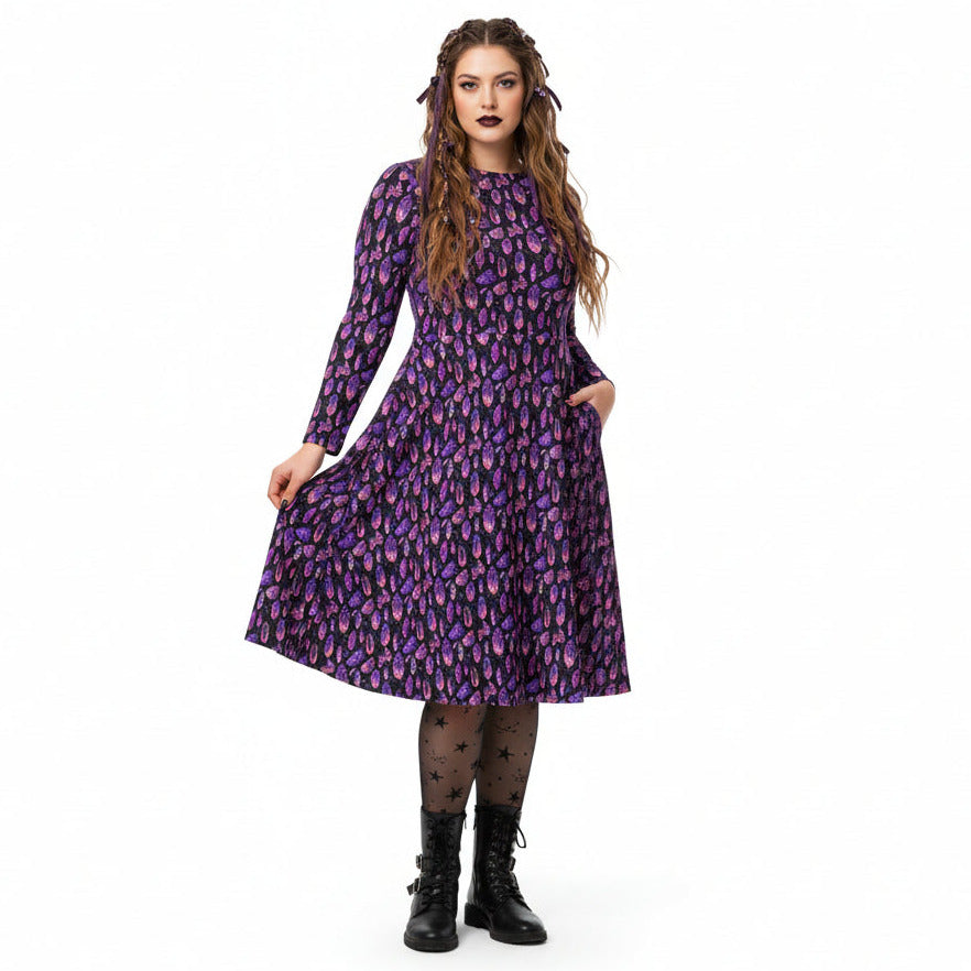 Woman wearing a purple floral dress on a white background