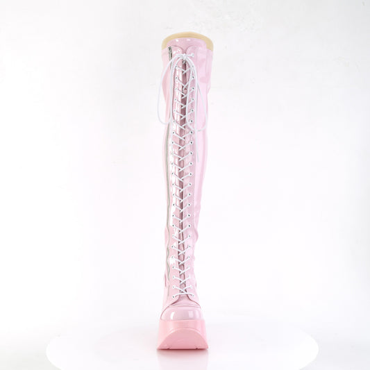 Pink holographic thigh-high platform wedge boots with star cutout and lace-up front