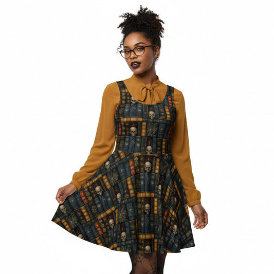 Woman wearing a dark academia skater dress with a vintage bookshelf and skull print, styled with a mustard yellow pussybow blouse and round glasses.