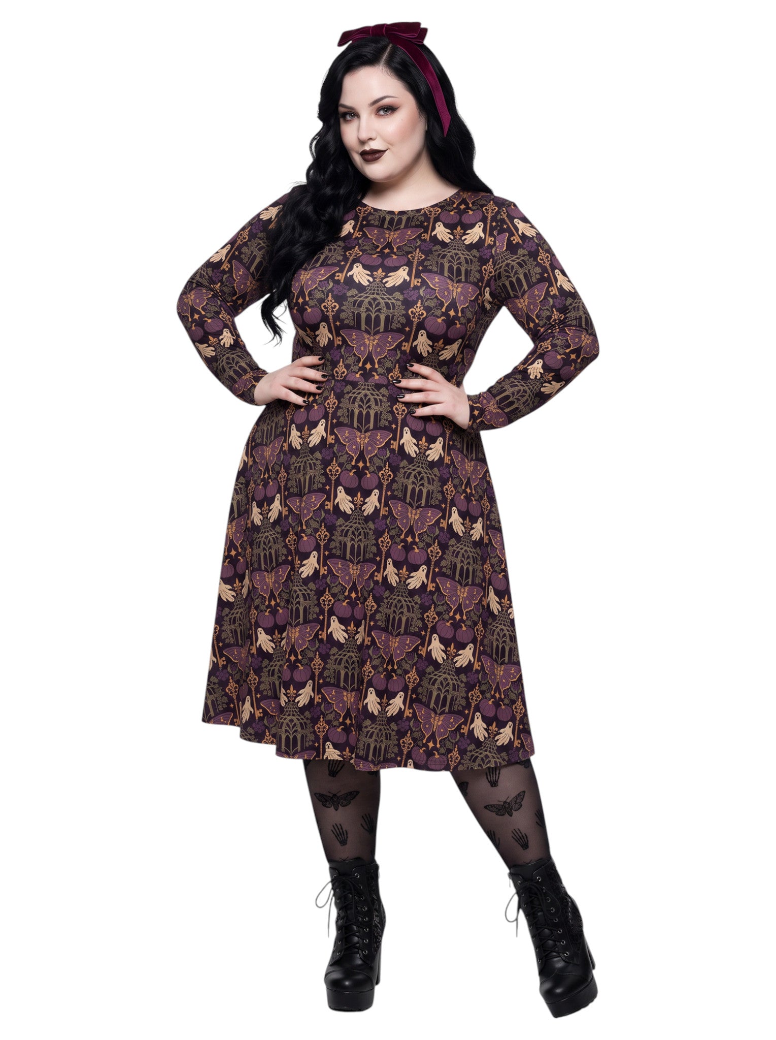 Plus size woman wearing a purple Whimsigoth gothic moth pattern long sleeve dress with pockets