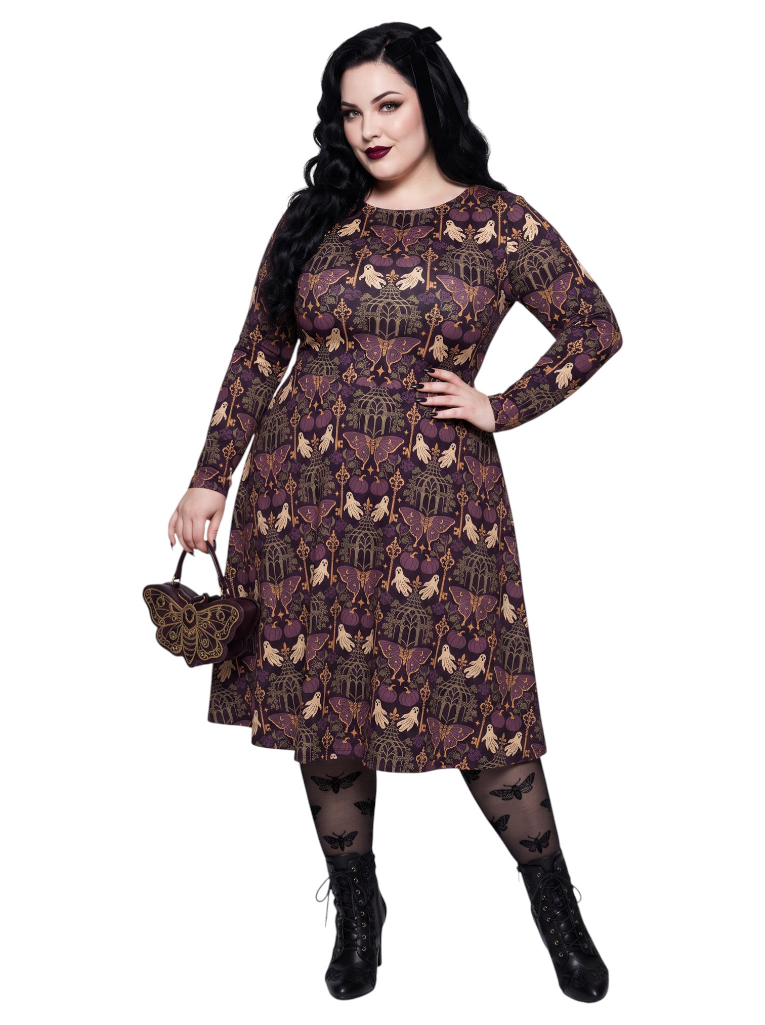 Plus size woman wearing a purple Whimsigoth gothic moth pattern long sleeve dress with pockets
