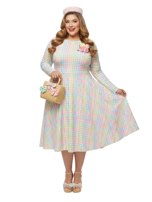 Woman wearing plus size pastel rainbow gingham long sleeve vintage swing dress with pockets.