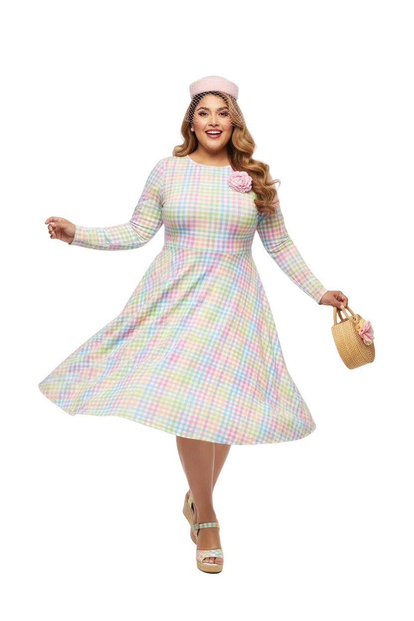 Plus size woman wearing a pastel rainbow gingham long sleeve vintage swing dress with a boat neckline and pockets.