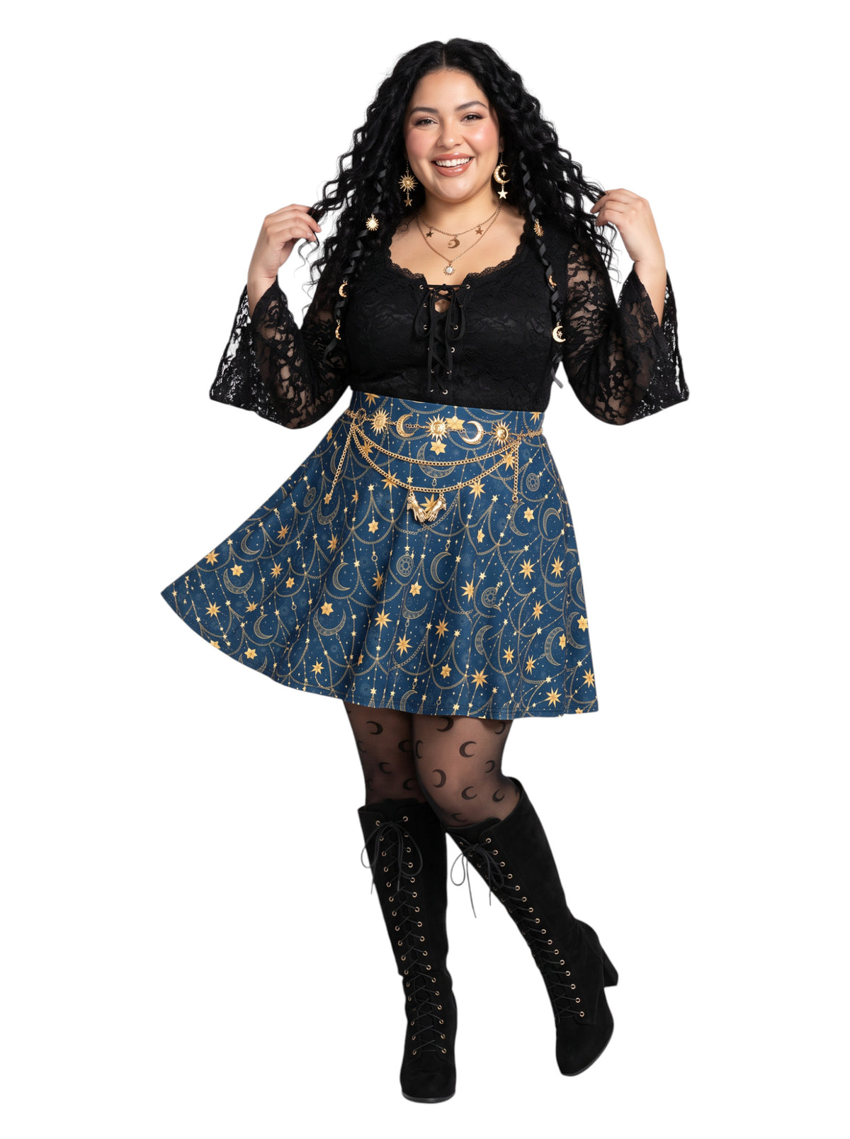 Plus-size model wearing a high-waisted whimsigoth celestial skater skirt in navy blue with a gold sun and moon pattern, featuring a soft and stretchy fit and flare silhouette.